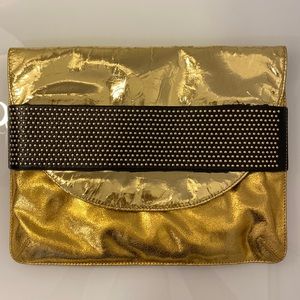 Badgley Mischka Gold shiny clutch w/black studded detail (has detachable strap)
